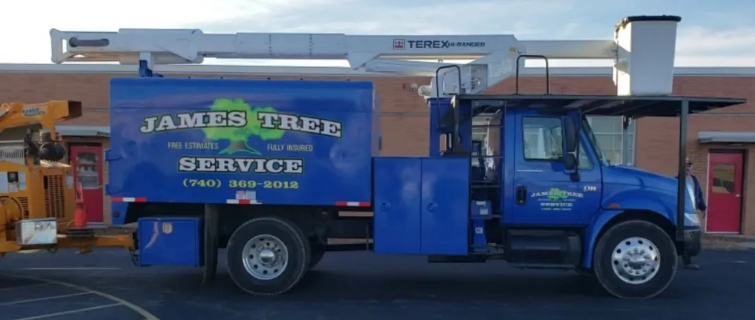 The blue James Tree Service truck Delaware, Ohio has known for decades